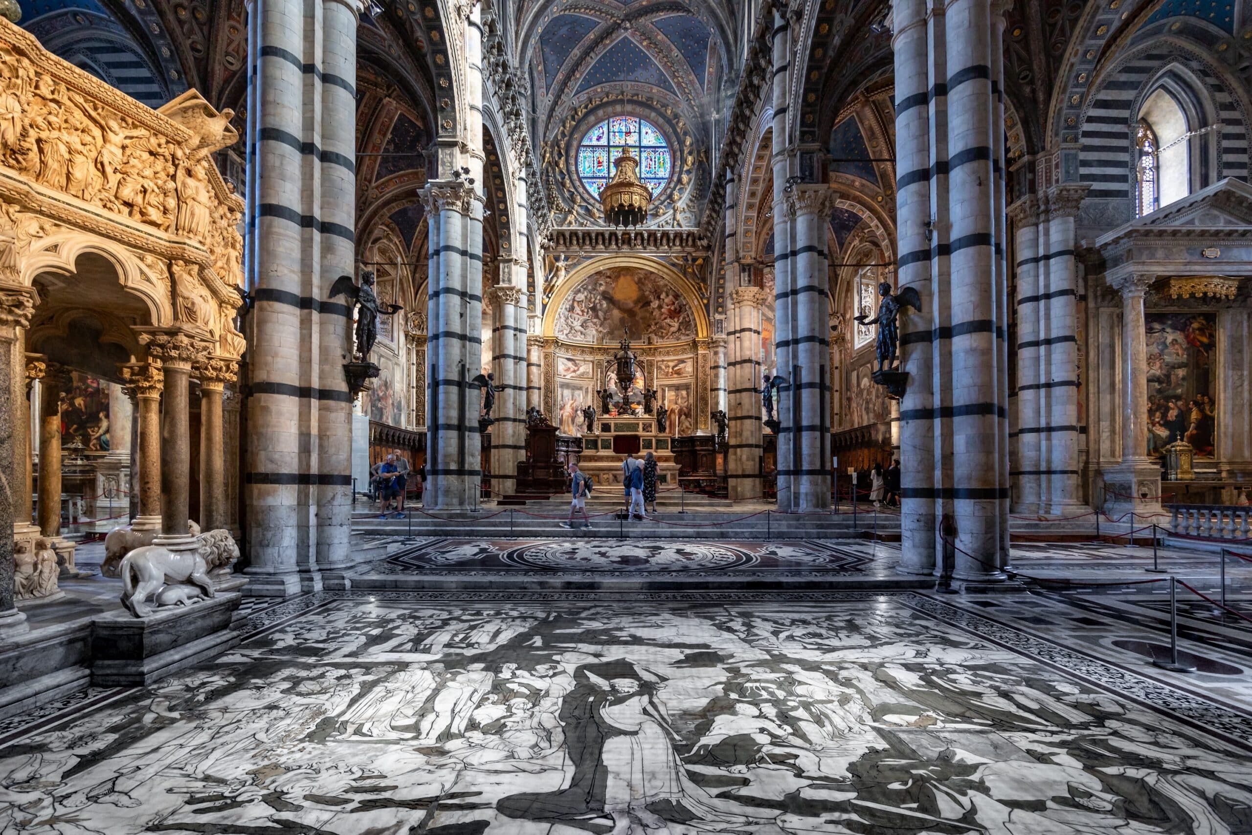Siena, Italy - Oct 09, 2023: Exquisite gothic style architectural details of Duomo di Siena famous catholic cathedral interior