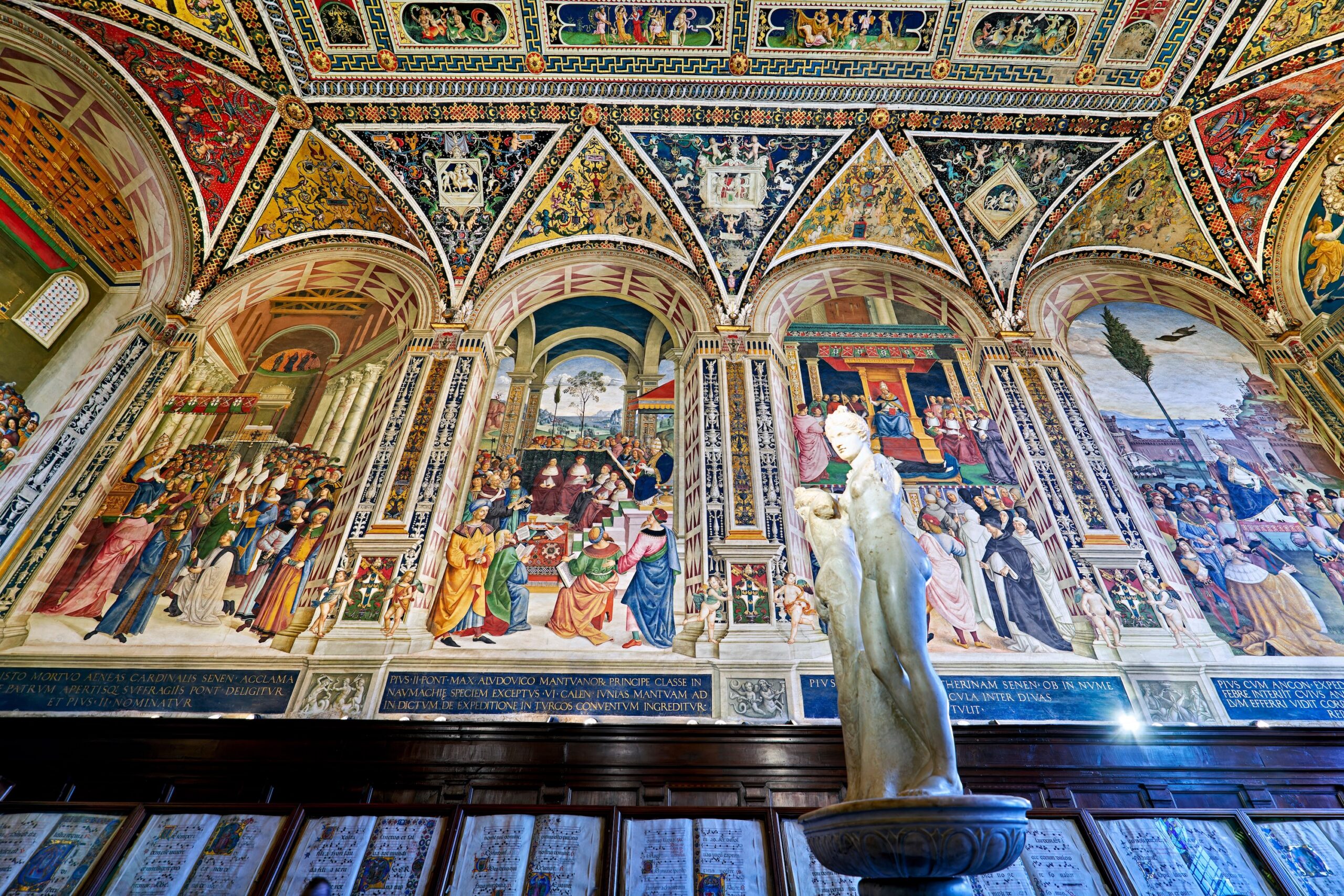 Siena Tuscany Italy. The Cathedral. Piccolomini Library with frescoes by Pinturicchio - Date: 08 - 04 - 2023
