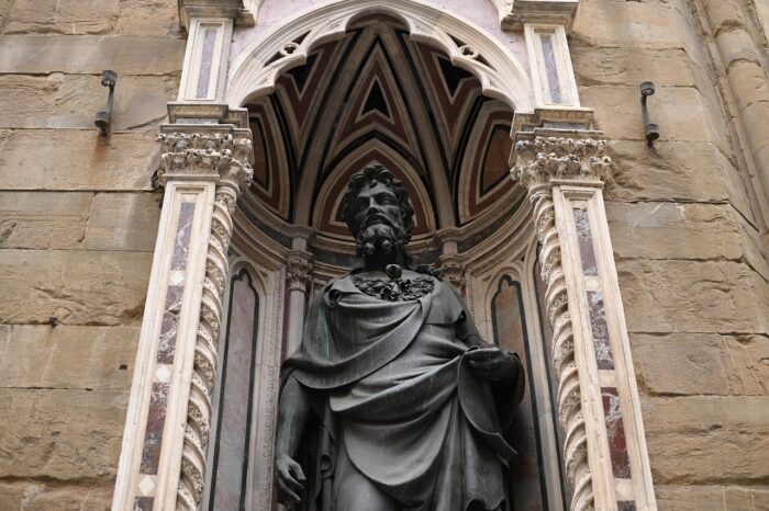 a statue of a stone building