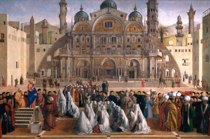a group of people standing in front of a building