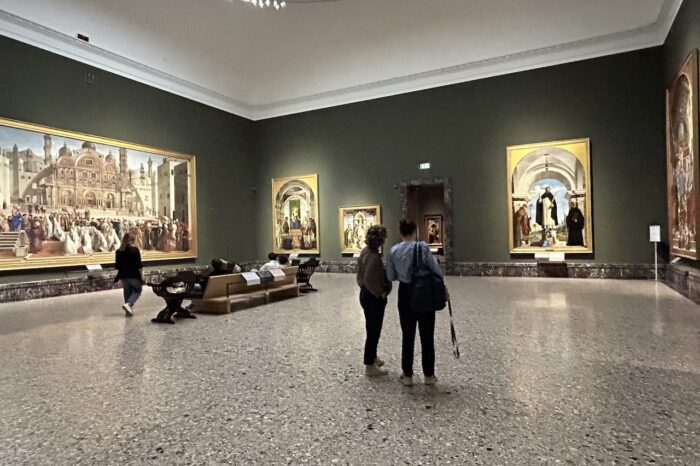 a group of people standing in a room