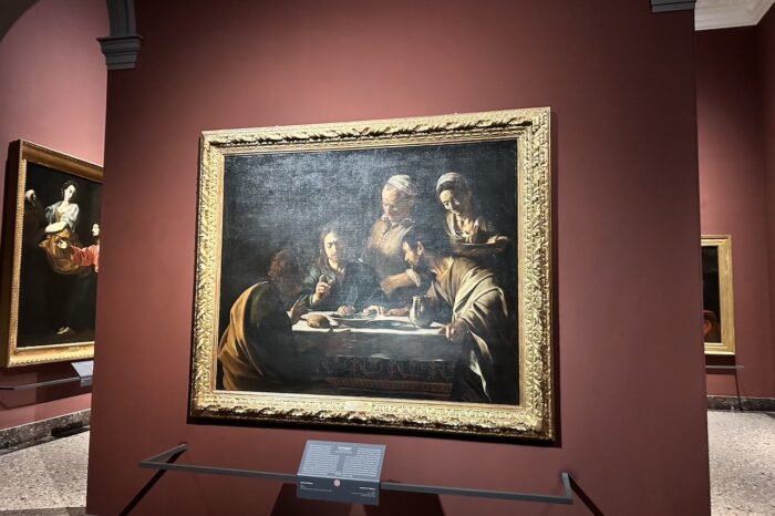a painting hanging on a wall