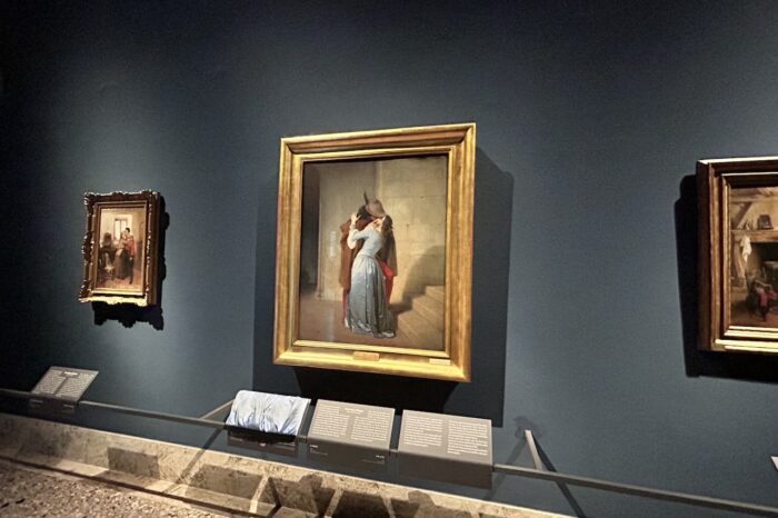 a painting hanging on a wall