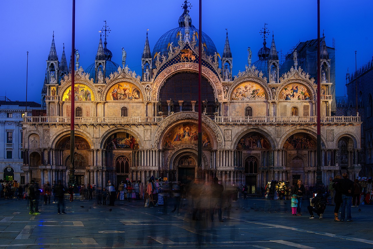 a close up of a church with St Mark's Basilica in the background