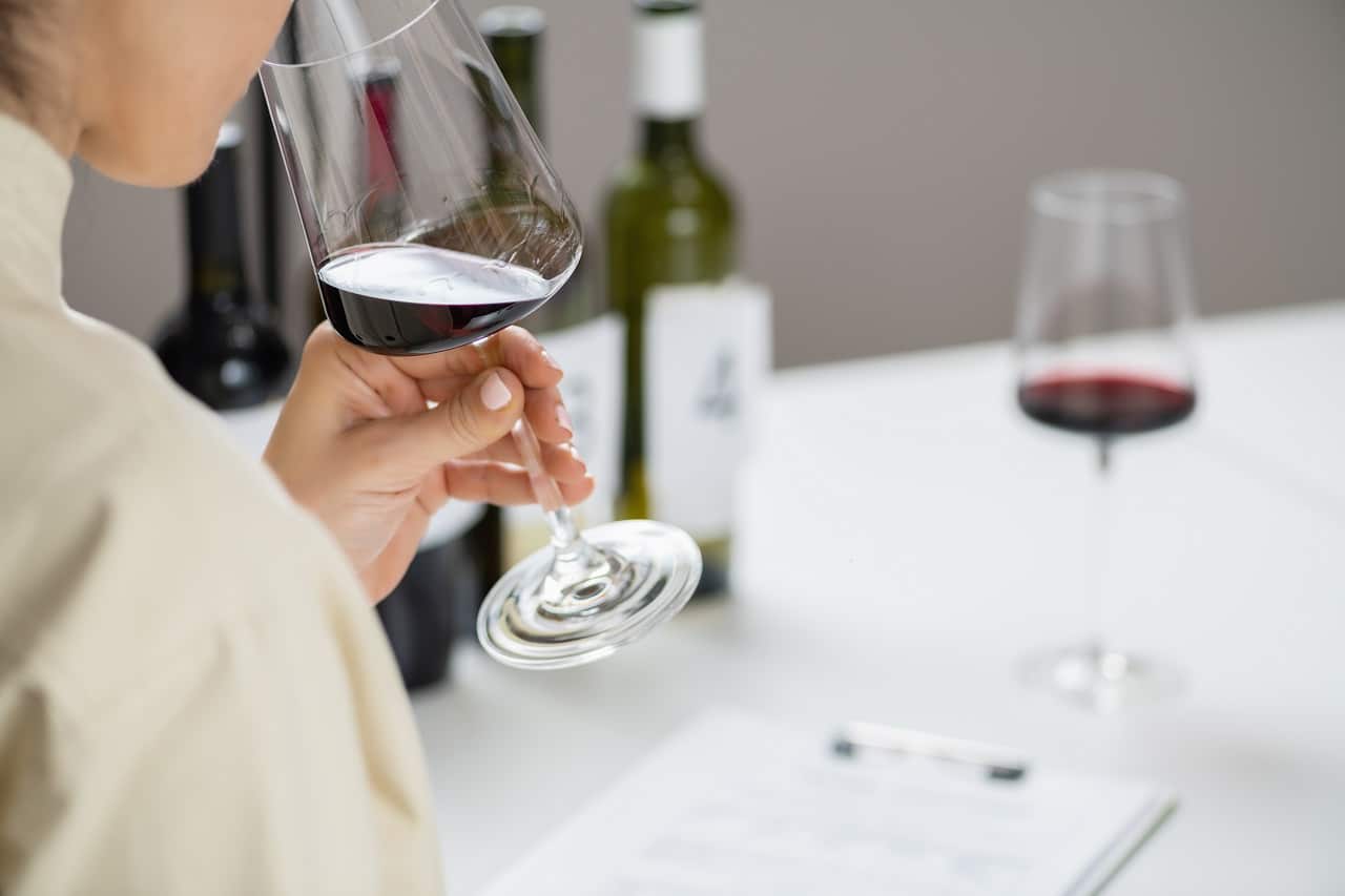Wine,Tasting.,A,Woman,Enjoys,A,Red,Wine,Tasting,,Savoring