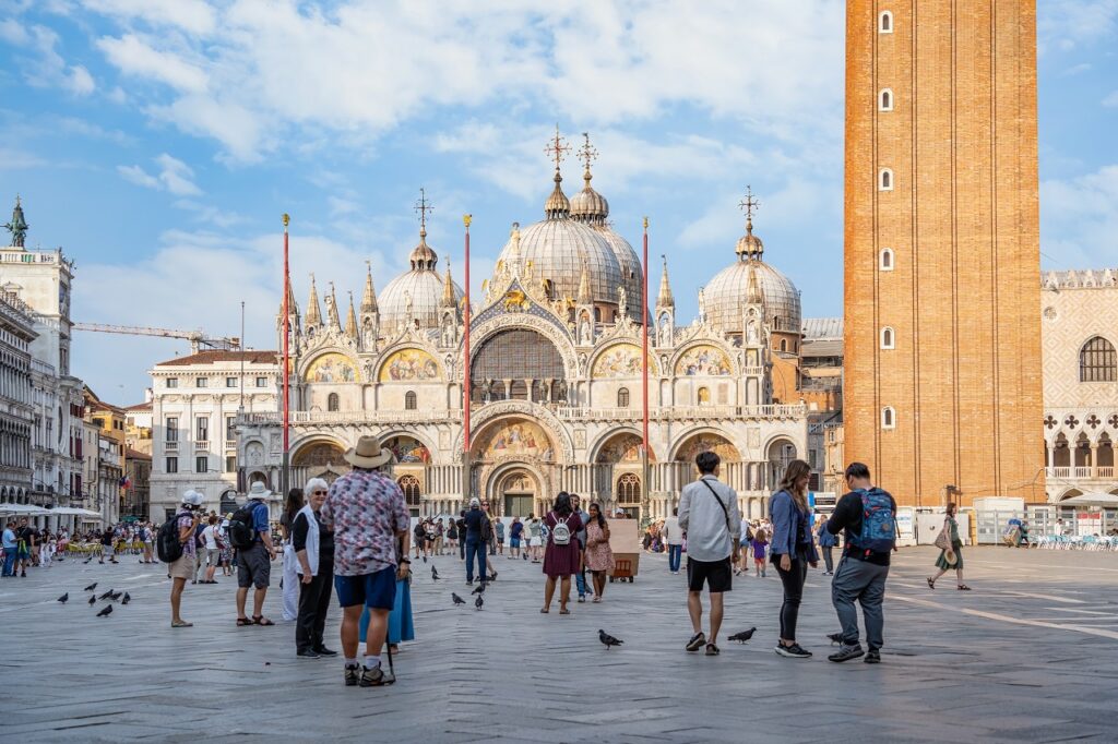 people on a square enjoying a walking tour