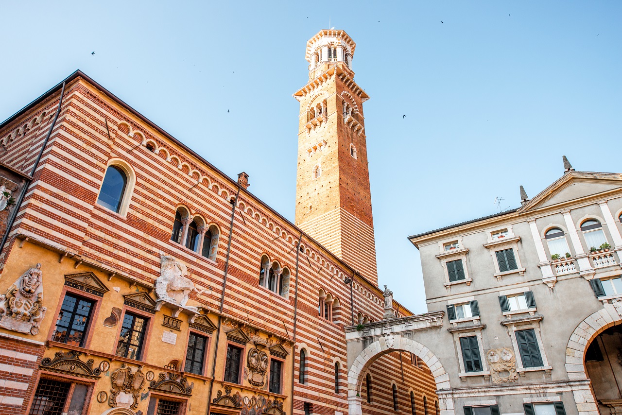 Ragione palace with Lamberti tower in the center of Verona old town in Italy