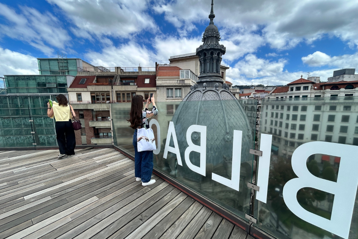 Bilbao rooftop view of the city skyline with historic dome and rooftops