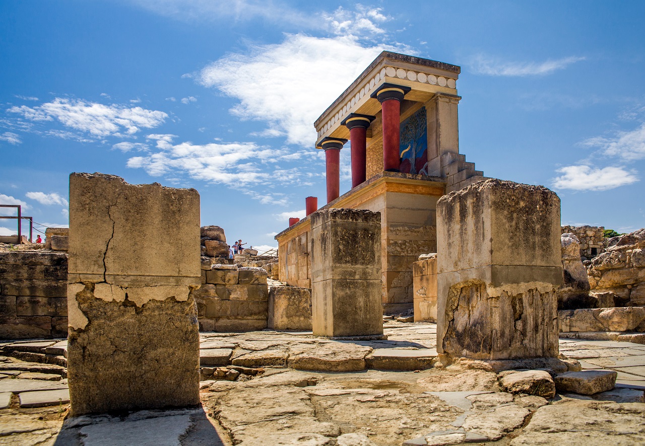 Red columns of the Knossos palace. Knossos palace on the island of Crete in Greece. Ancient ruins of the burning part of the Archaeological Museum in Heraklion.