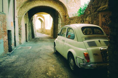 a car parked in front of a building