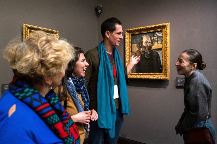 a group of people standing in a room