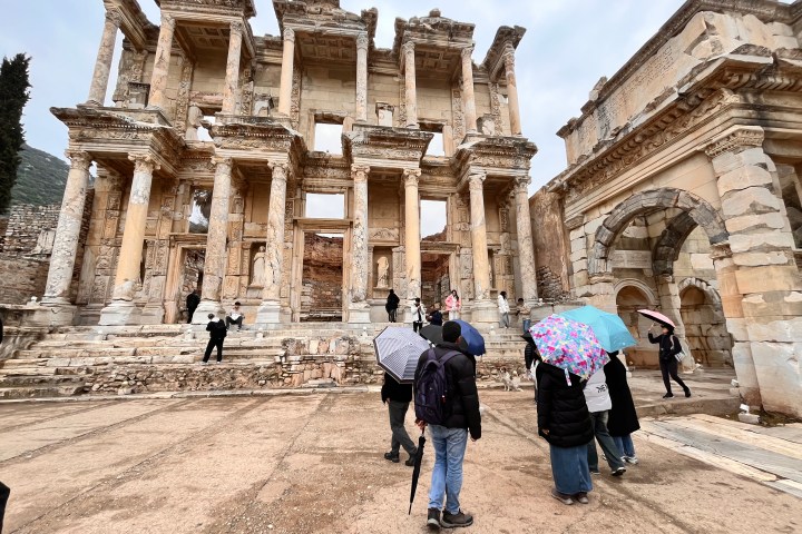 a group of people standing in front of a building